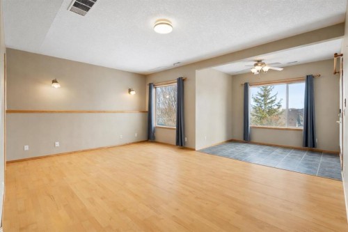 38 Bow Ridge Link Link, Cochrane, AB - Indoor Photo Showing Other Room