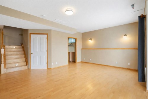 38 Bow Ridge Link Link, Cochrane, AB - Indoor Photo Showing Other Room