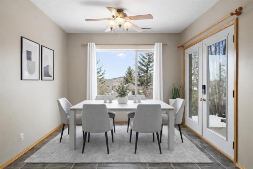38 Bow Ridge Link Link, Cochrane, AB - Indoor Photo Showing Dining Room