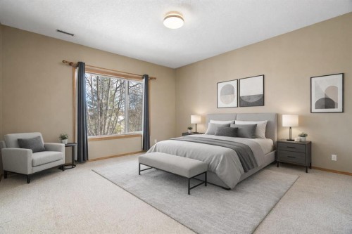 38 Bow Ridge Link Link, Cochrane, AB - Indoor Photo Showing Bedroom