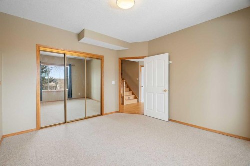 38 Bow Ridge Link Link, Cochrane, AB - Indoor Photo Showing Other Room