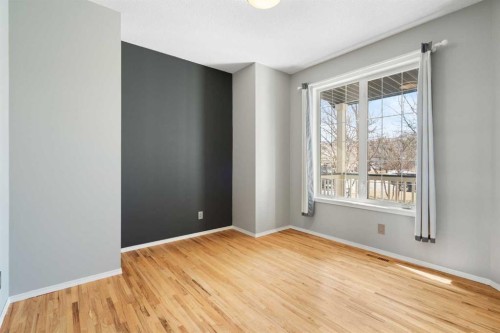 38 Bow Ridge Link Link, Cochrane, AB - Indoor Photo Showing Other Room