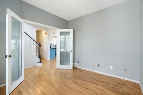 38 Bow Ridge Link Link, Cochrane, AB - Indoor Photo Showing Other Room