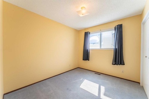 23 Mountain Place, Okotoks, AB - Indoor Photo Showing Other Room