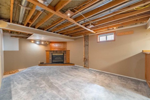 23 Mountain Place, Okotoks, AB - Indoor Photo Showing Basement