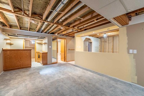 23 Mountain Place, Okotoks, AB - Indoor Photo Showing Basement