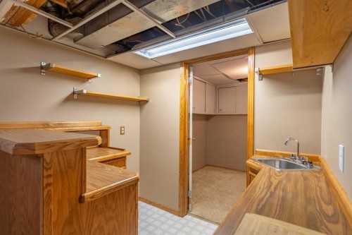 23 Mountain Place, Okotoks, AB - Indoor Photo Showing Basement