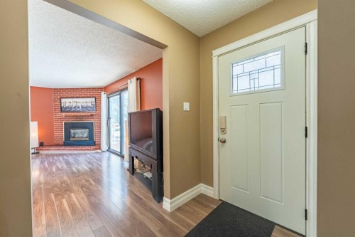23 Mountain Place, Okotoks, AB - Indoor With Fireplace