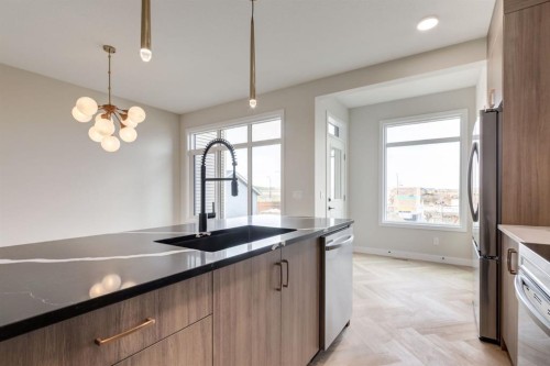 214 Sora Gardens Se, Calgary, AB - Indoor Photo Showing Kitchen With Upgraded Kitchen
