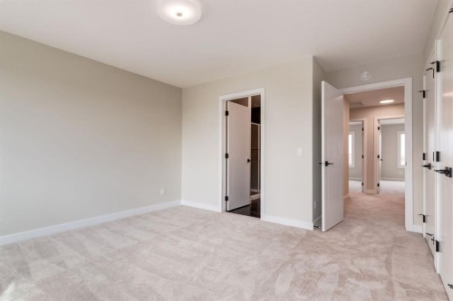 214 Sora Gardens Se, Calgary, AB - Indoor Photo Showing Other Room