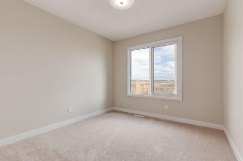 214 Sora Gardens Se, Calgary, AB - Indoor Photo Showing Other Room