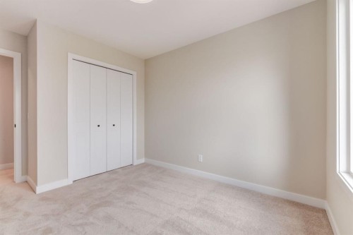 214 Sora Gardens Se, Calgary, AB - Indoor Photo Showing Other Room