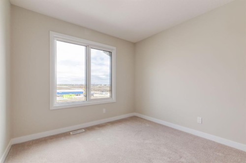 214 Sora Gardens Se, Calgary, AB - Indoor Photo Showing Other Room