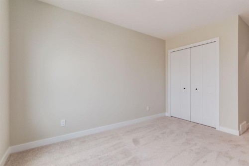 214 Sora Gardens Se, Calgary, AB - Indoor Photo Showing Other Room