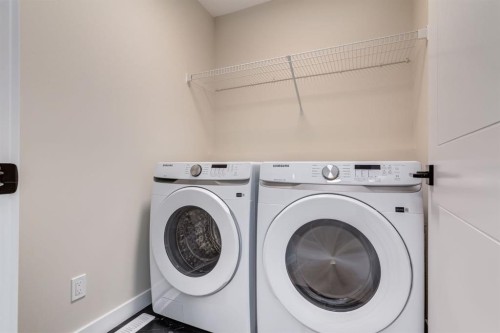 214 Sora Gardens Se, Calgary, AB - Indoor Photo Showing Laundry Room