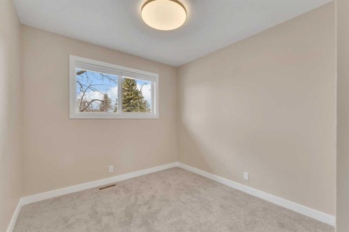 221 Madeira Crescent Ne, Calgary, AB - Indoor Photo Showing Other Room