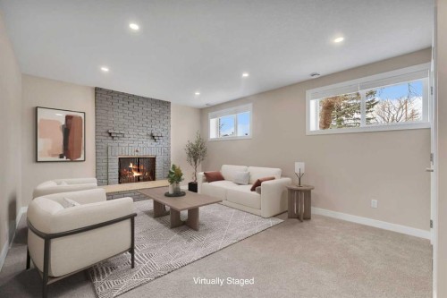 221 Madeira Crescent Ne, Calgary, AB - Indoor With Fireplace