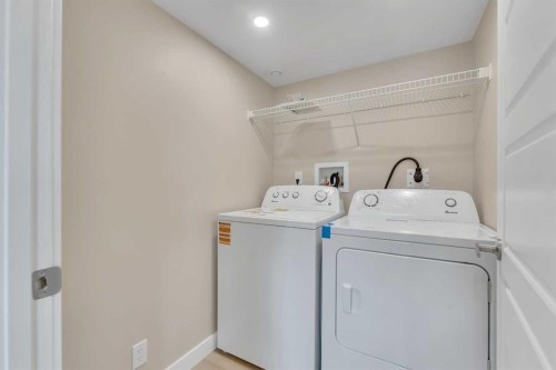 221 Madeira Crescent Ne, Calgary, AB - Indoor Photo Showing Laundry Room