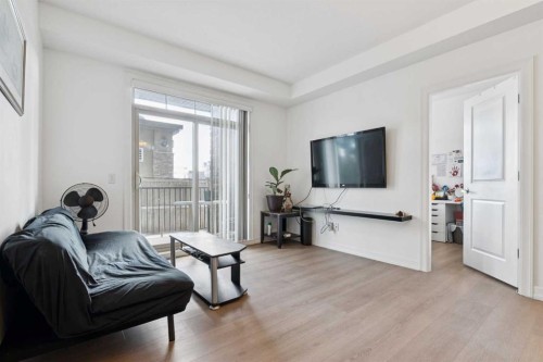 116-117 Copperpond Common Se, Calgary, AB - Indoor Photo Showing Living Room
