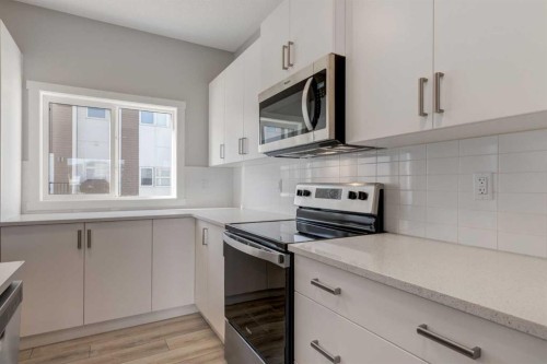 156 Walden Lane Se, Calgary, AB - Indoor Photo Showing Kitchen