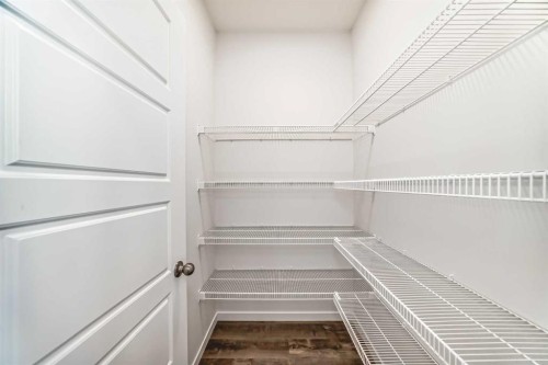 72 Wedderburn Drive, Okotoks, AB - Indoor With Storage