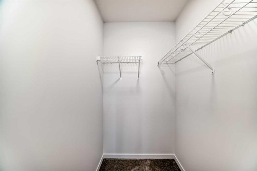 72 Wedderburn Drive, Okotoks, AB - Indoor With Storage
