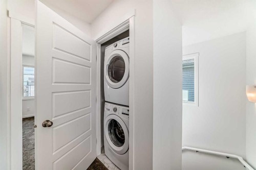 72 Wedderburn Drive, Okotoks, AB - Indoor Photo Showing Laundry Room