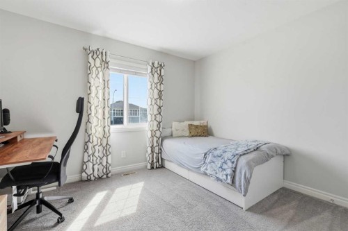 345 Evansglen Drive Nw, Calgary, AB - Indoor Photo Showing Bedroom