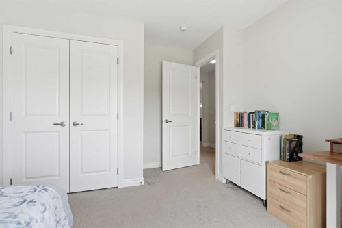 345 Evansglen Drive Nw, Calgary, AB - Indoor Photo Showing Bedroom