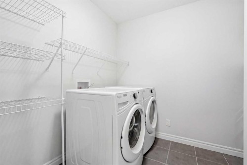 345 Evansglen Drive Nw, Calgary, AB - Indoor Photo Showing Laundry Room