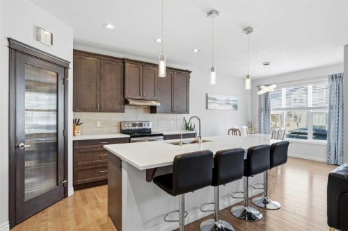 345 Evansglen Drive Nw, Calgary, AB - Indoor Photo Showing Kitchen With Upgraded Kitchen