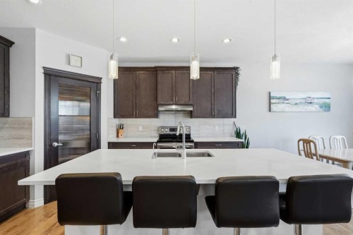 345 Evansglen Drive Nw, Calgary, AB - Indoor Photo Showing Kitchen With Double Sink With Upgraded Kitchen