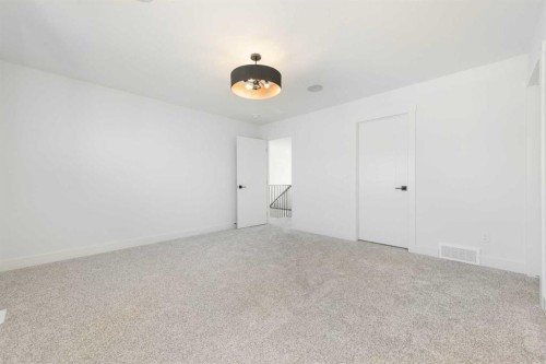 105 Waterford Passage, Chestermere, AB - Indoor Photo Showing Other Room