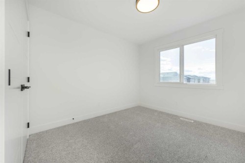 105 Waterford Passage, Chestermere, AB - Indoor Photo Showing Other Room