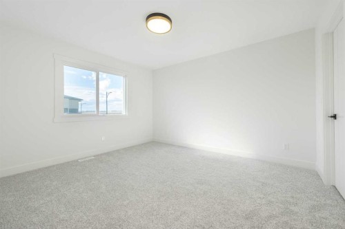 105 Waterford Passage, Chestermere, AB - Indoor Photo Showing Other Room