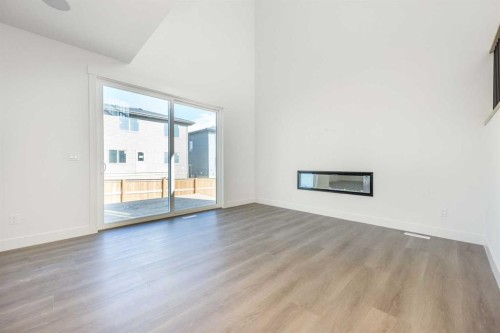 105 Waterford Passage, Chestermere, AB - Indoor With Fireplace