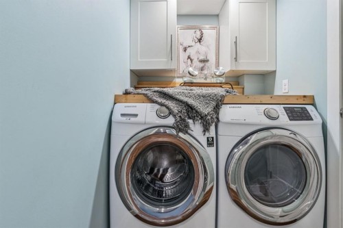 143 Fireside Drive, Cochrane, AB - Indoor Photo Showing Laundry Room