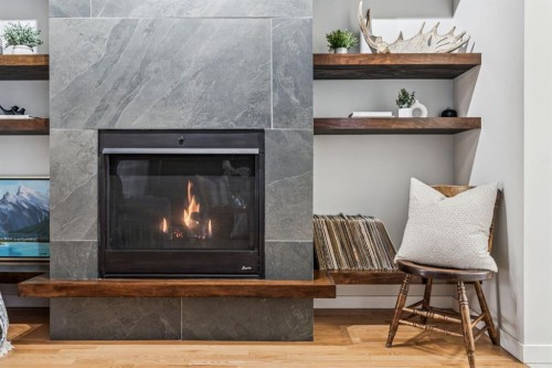 143 Fireside Drive, Cochrane, AB - Indoor With Fireplace