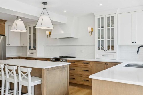 5-140 Point Drive Nw, Calgary, AB - Indoor Photo Showing Kitchen With Double Sink With Upgraded Kitchen
