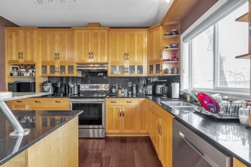 69-39 Strathlea Common Sw, Calgary, AB - Indoor Photo Showing Kitchen With Double Sink