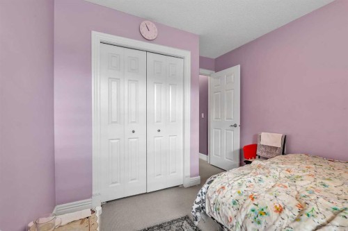 69-39 Strathlea Common Sw, Calgary, AB - Indoor Photo Showing Bedroom