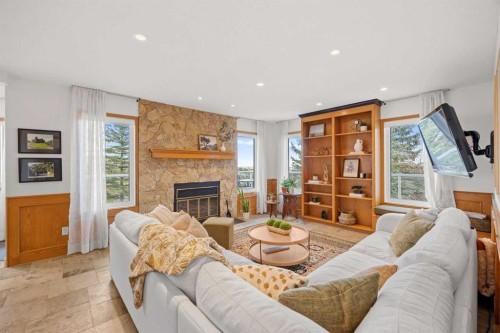 47 Edgeridge Court Nw, Calgary, AB - Indoor Photo Showing Living Room With Fireplace