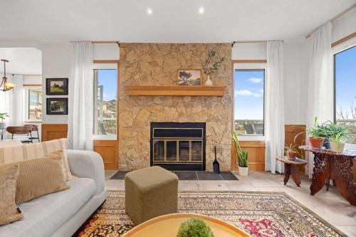 47 Edgeridge Court Nw, Calgary, AB - Indoor Photo Showing Living Room With Fireplace