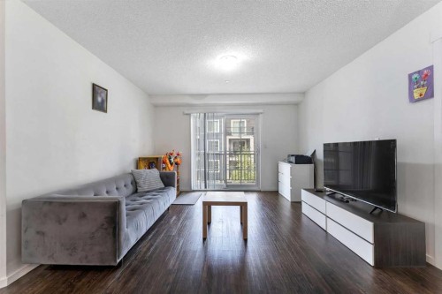 3305-755 Copperpond Boulevard, Calgary, AB - Indoor Photo Showing Living Room