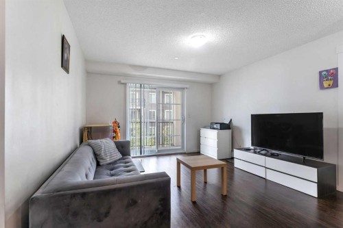 3305-755 Copperpond Boulevard, Calgary, AB - Indoor Photo Showing Living Room