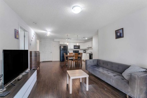 3305-755 Copperpond Boulevard, Calgary, AB - Indoor Photo Showing Living Room