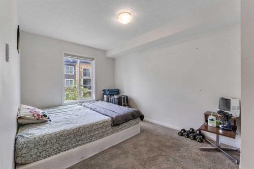 3305-755 Copperpond Boulevard, Calgary, AB - Indoor Photo Showing Bedroom