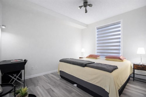 1117-1140 Taradale Drive Ne, Calgary, AB - Indoor Photo Showing Bedroom