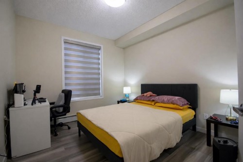 1117-1140 Taradale Drive Ne, Calgary, AB - Indoor Photo Showing Bedroom