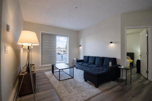 1117-1140 Taradale Drive Ne, Calgary, AB - Indoor Photo Showing Living Room